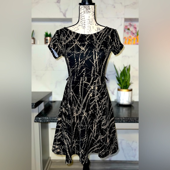 SMALL gently used, skater dress with side loops for a belt of your choice. - Picture 1 of 2